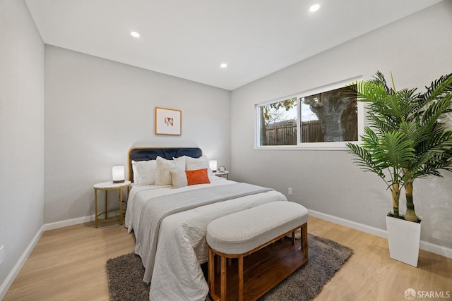 bedroom with light hardwood / wood-style floors