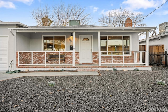 ranch-style home with a porch