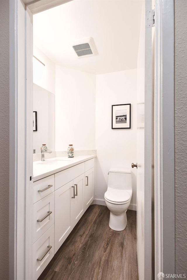 1360 9th Ave Unit 7, San Francisco, CA 94122 - bathroom featuring wood finished floors and vanity