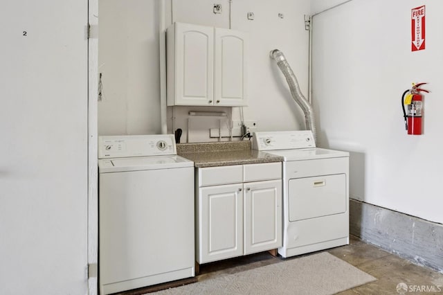 1205 Oak St Unit 2, San Francisco, CA 94117 - laundry area with cabinet space and washer and dryer