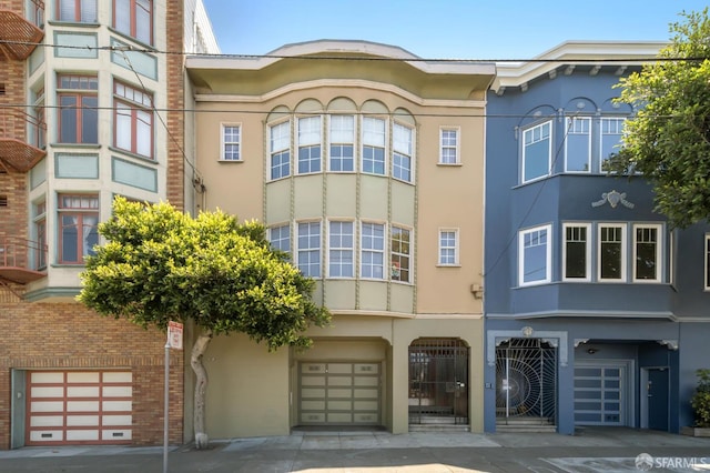 1205 Oak St Unit 2, San Francisco, CA 94117 - view of property featuring an attached garage