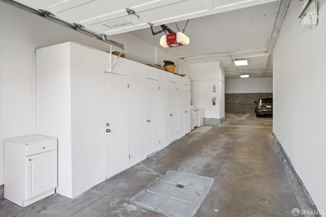 1205 Oak St Unit 2, San Francisco, CA 94117 - garage featuring a garage door opener