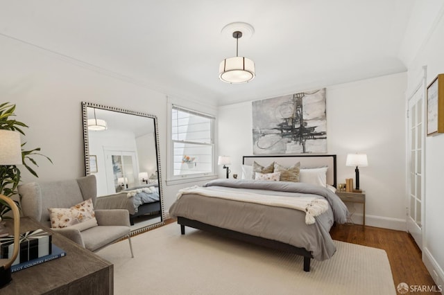 1205 Oak St Unit 2, San Francisco, CA 94117 - bedroom featuring wood finished floors and baseboards