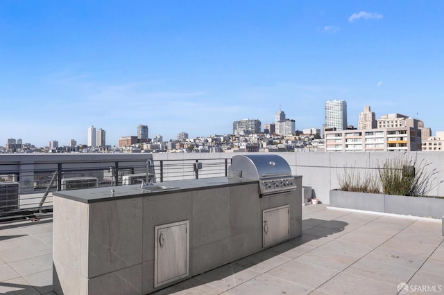 1433 Bush St Unit 702, San Francisco, CA 94109 - view of patio / terrace featuring area for grilling, a balcony, an outdoor kitchen, and sink