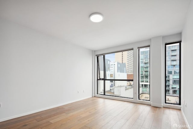 1433 Bush St Unit 702, San Francisco, CA 94109 - unfurnished room with light hardwood / wood-style flooring