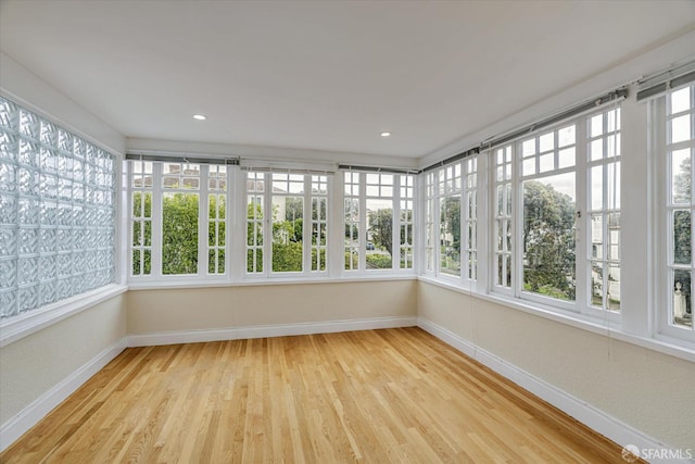 unfurnished sunroom with a healthy amount of sunlight