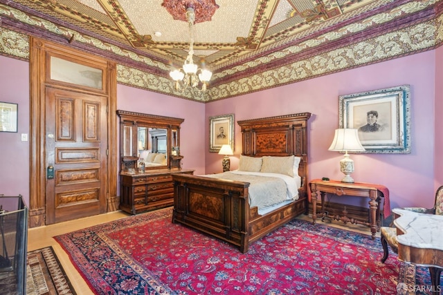 bedroom featuring a chandelier and crown molding