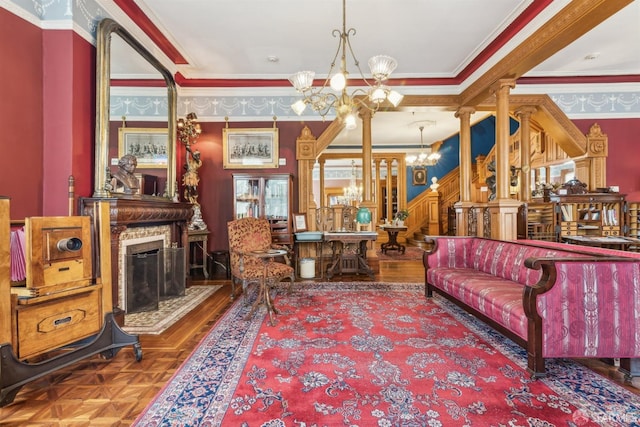 living room with parquet flooring, ornamental molding, and decorative columns