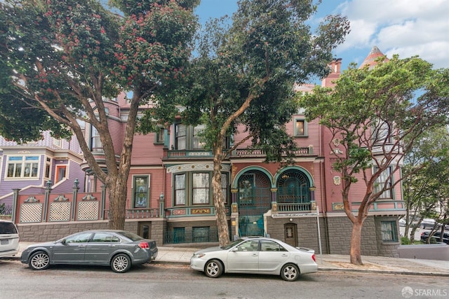 view of front of home with a balcony