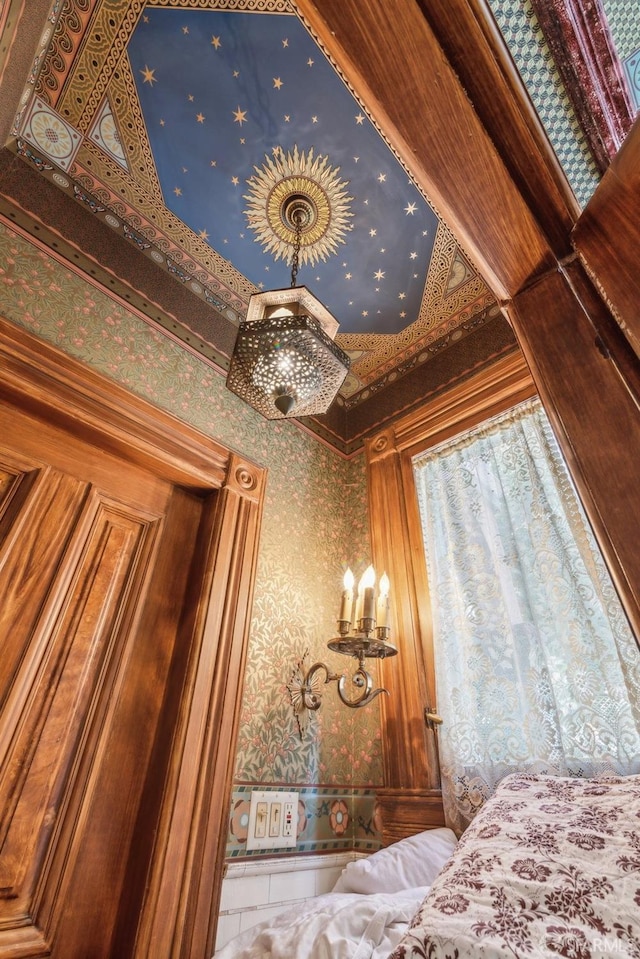 interior details featuring wallpapered walls