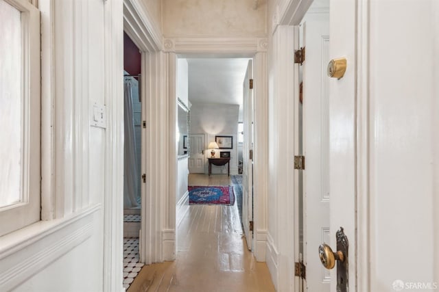 corridor featuring light wood-type flooring