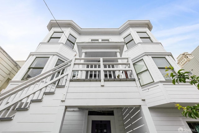 837 Union St, San Francisco, CA 94133 - view of property exterior with a balcony and stairs