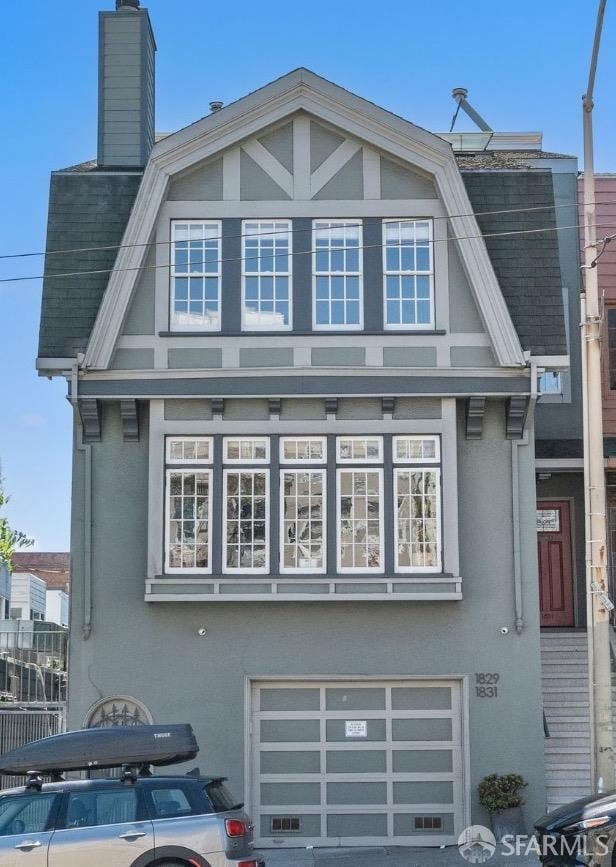 view of front of home featuring a garage