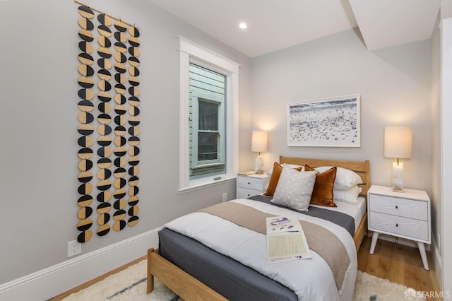 bedroom featuring light hardwood / wood-style flooring