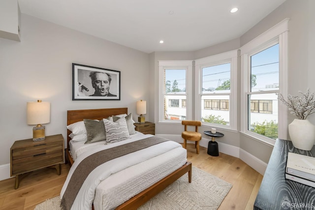 bedroom featuring light wood-type flooring