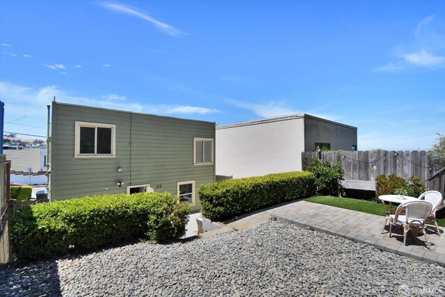 1675 Quint St, San Francisco, CA 94124 - rear view of house with a patio