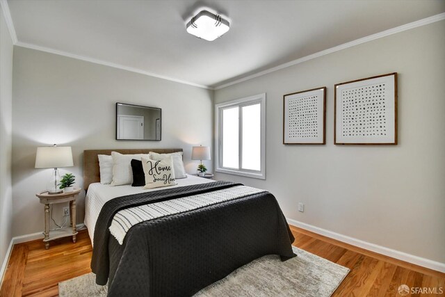 1675 Quint St, San Francisco, CA 94124 - bedroom featuring baseboards, ornamental molding, and wood finished floors