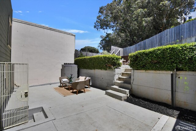 1675 Quint St, San Francisco, CA 94124 - fenced backyard with a patio area