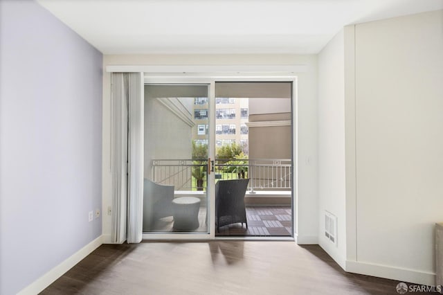 empty room featuring hardwood / wood-style floors