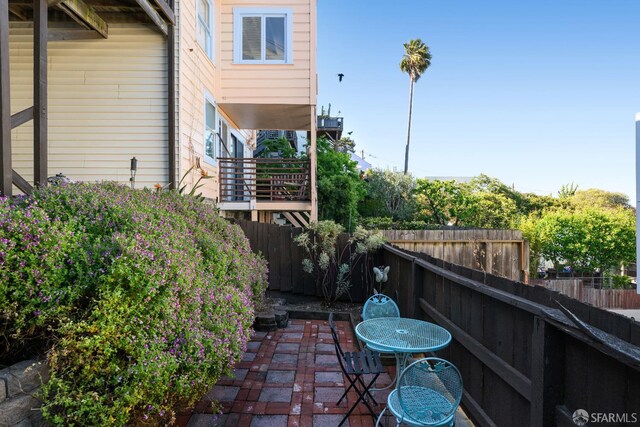 1141 Church St, San Francisco, CA 94114 - fenced backyard with a patio area