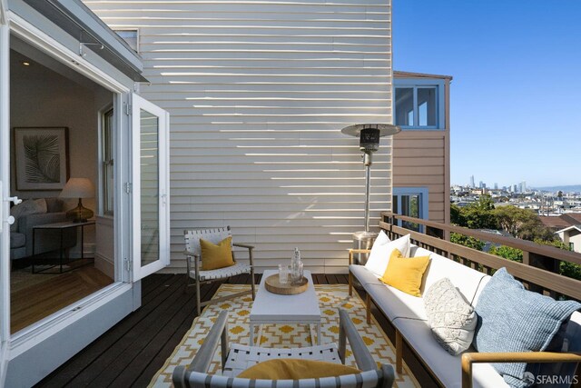 1141 Church St, San Francisco, CA 94114 - wooden deck featuring outdoor lounge area and a city view