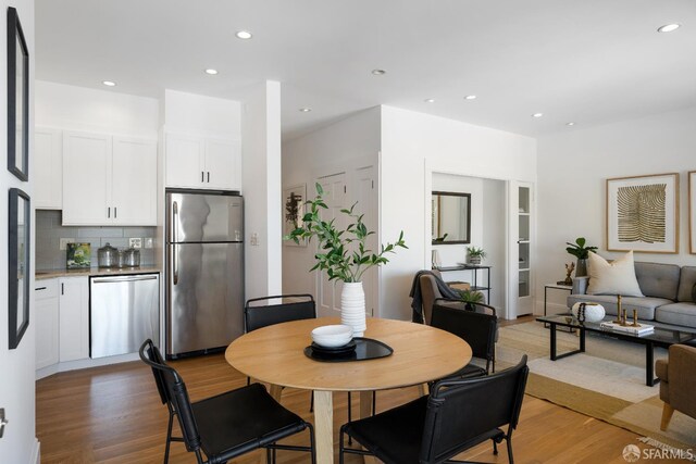 1141 Church St, San Francisco, CA 94114 - dining area featuring light wood-style flooring and recessed lighting