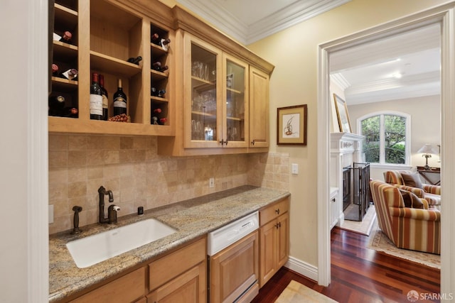 bar featuring sink, dishwasher, backsplash, light stone counters, and dark hardwood / wood-style flooring