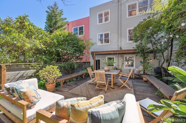 deck featuring outdoor dining space