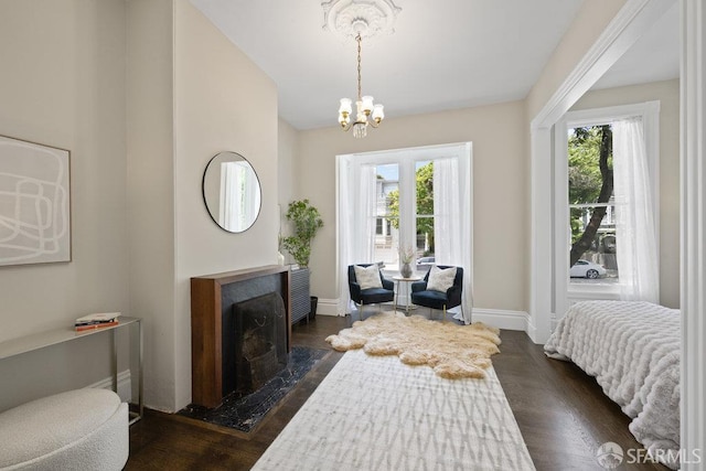 2013-2015 Golden Gate Ave, San Francisco, CA 94115 - bedroom featuring multiple windows, dark wood-style floors, and a chandelier