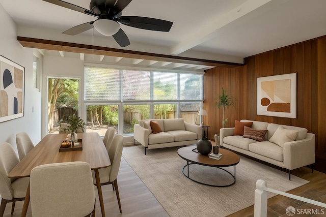 2013-2015 Golden Gate Ave, San Francisco, CA 94115 - living room with wooden walls, wood finished floors, beamed ceiling, and a ceiling fan