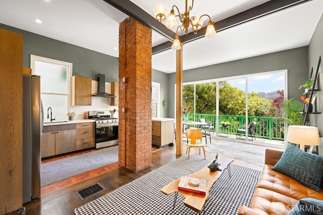 2013-2015 Golden Gate Ave, San Francisco, CA 94115 - living area featuring dark wood finished floors, a chandelier, and recessed lighting