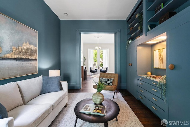 2013-2015 Golden Gate Ave, San Francisco, CA 94115 - living area featuring dark wood finished floors and a chandelier