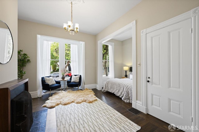 2013-2015 Golden Gate Ave, San Francisco, CA 94115 - bedroom featuring a chandelier and baseboards