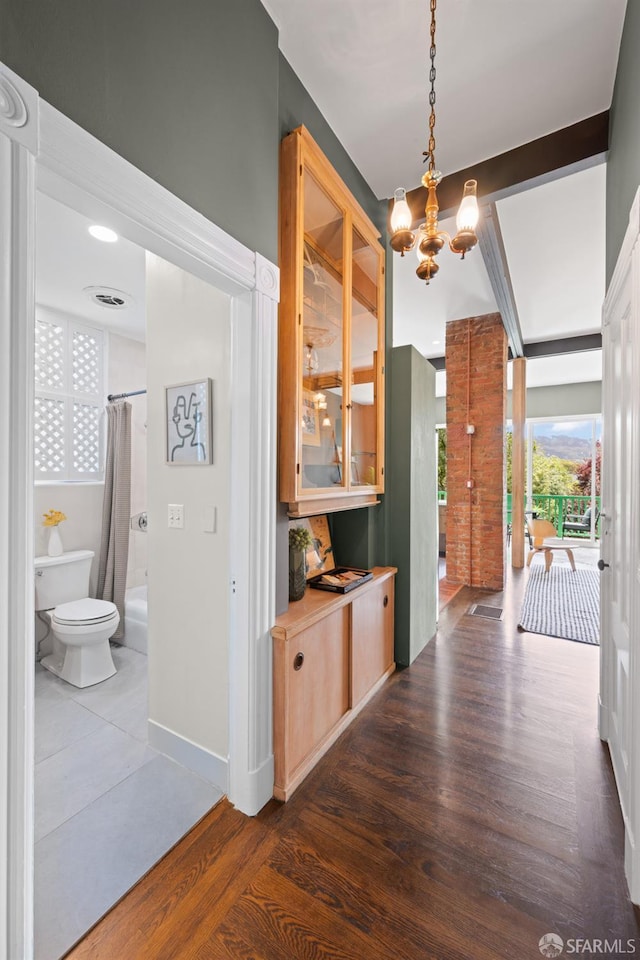2013-2015 Golden Gate Ave, San Francisco, CA 94115 - hall with dark wood-style flooring and a chandelier