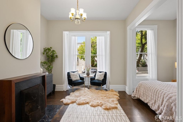 2013-2015 Golden Gate Ave, San Francisco, CA 94115 - bedroom with multiple windows, a chandelier, and dark wood finished floors