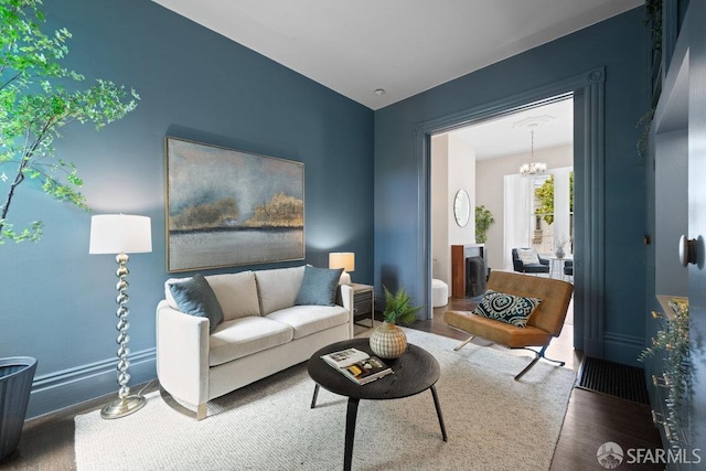 2013-2015 Golden Gate Ave, San Francisco, CA 94115 - living room with wood finished floors and a chandelier