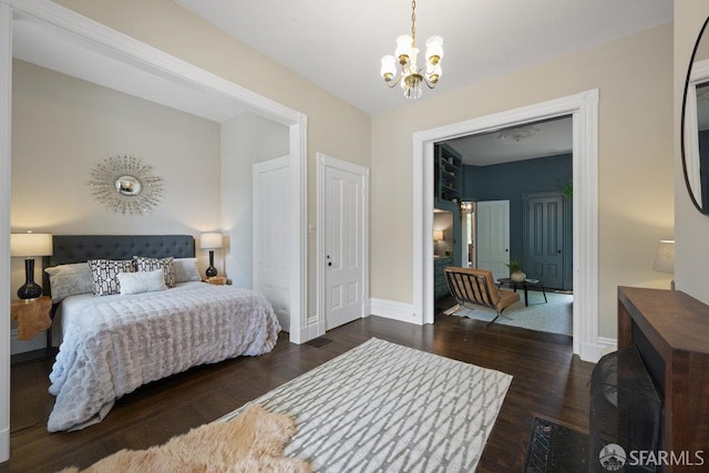 2013-2015 Golden Gate Ave, San Francisco, CA 94115 - bedroom featuring a chandelier and wood finished floors