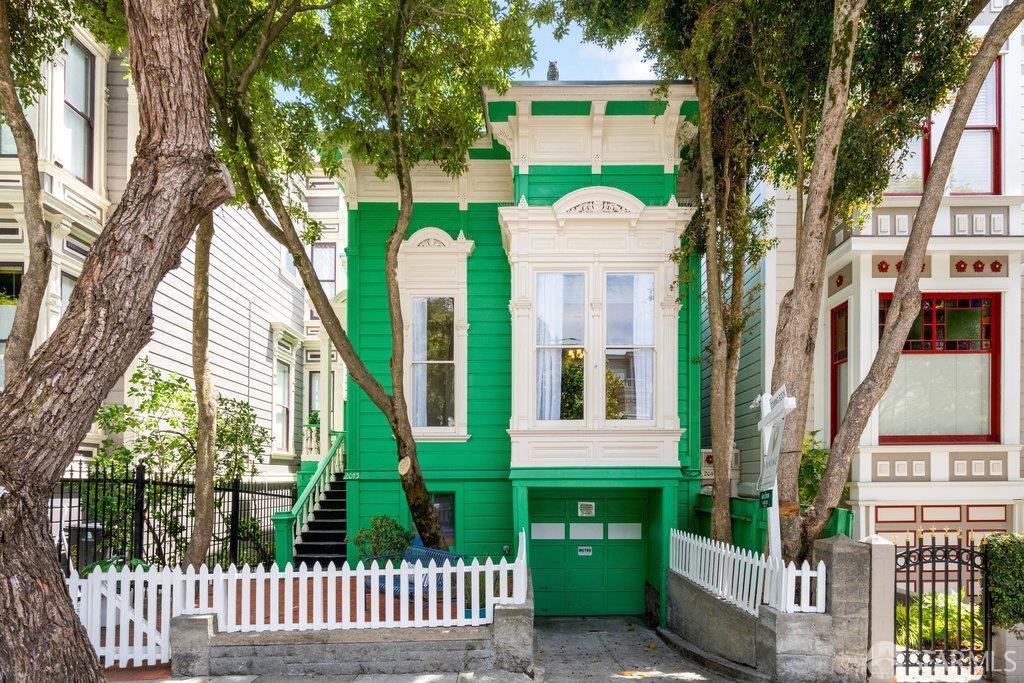 2013-2015 Golden Gate Ave, San Francisco, CA 94115 - view of front of property with a garage, a fenced front yard, and stairs