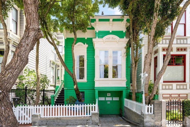 2013-2015 Golden Gate Ave, San Francisco, CA 94115 - view of front of property with a garage, a fenced front yard, and stairs