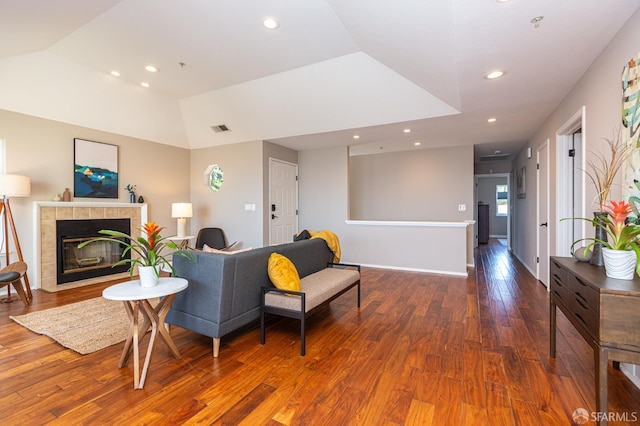 460 Pointe Pacific Dr Unit 4, Daly City, CA 94014 - living area featuring vaulted ceiling, hardwood / wood-style flooring, a tile fireplace, and recessed lighting