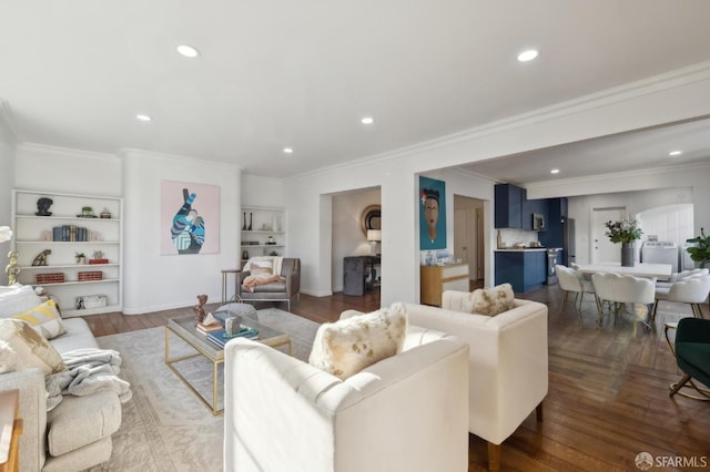 living room with dark hardwood / wood-style floors and ornamental molding