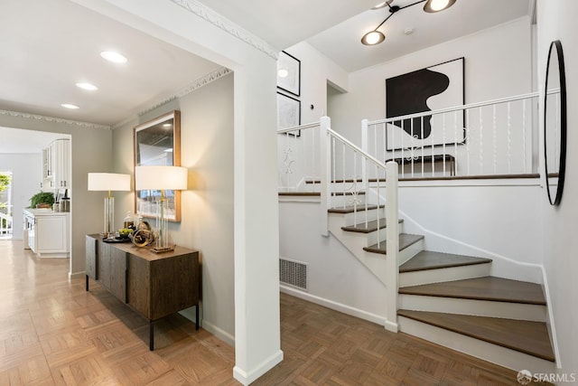 stairs featuring baseboards and recessed lighting