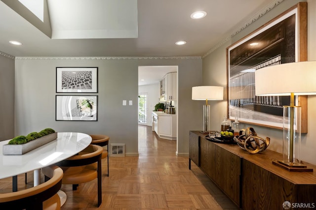 dining area featuring recessed lighting and baseboards