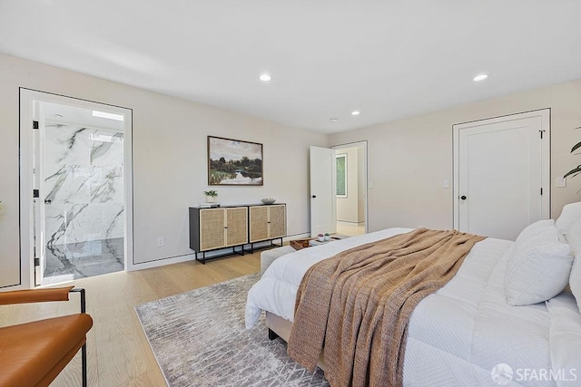 1098 Siler Pl, Berkeley, CA 94705 - bedroom featuring light wood-style flooring, recessed lighting, and connected bathroom