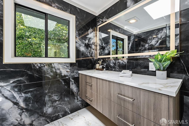 1098 Siler Pl, Berkeley, CA 94705 - full bath with marble tiled floors, double vanity, and tile walls