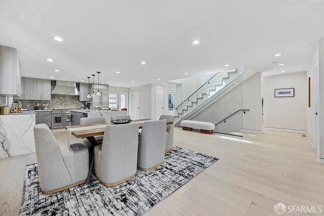 1098 Siler Pl, Berkeley, CA 94705 - dining space with light wood-type flooring, recessed lighting, stairs, and baseboards