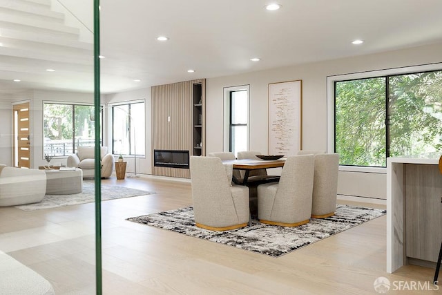 1098 Siler Pl, Berkeley, CA 94705 - dining room featuring recessed lighting, light wood-style floors, and a fireplace