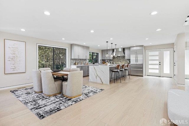 1098 Siler Pl, Berkeley, CA 94705 - dining space with light wood-style floors and recessed lighting