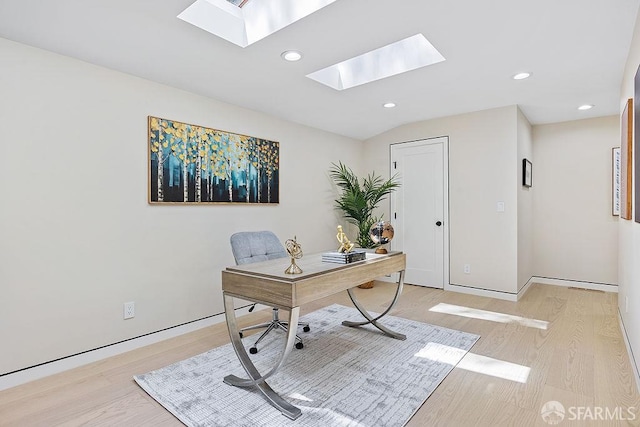 1098 Siler Pl, Berkeley, CA 94705 - home office featuring a skylight, light wood-style flooring, recessed lighting, and baseboards