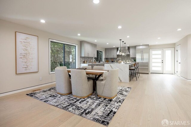 1098 Siler Pl, Berkeley, CA 94705 - dining area featuring light wood finished floors and recessed lighting